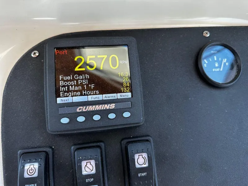 Slide: The Image of Control panel of 2008 Sabre 42 Hard Top Express showing engine metrics and fuel gauge. - 20