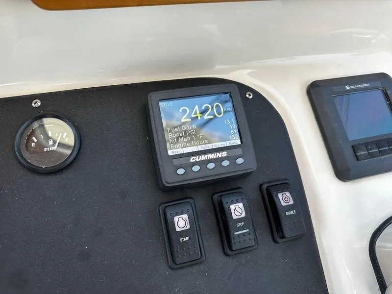 Slide: The Image of Control panel of 2008 Sabre 42 Hard Top Express with Cummins display and gauges. - 21