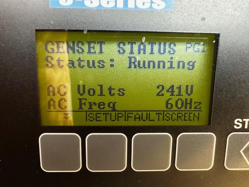 Slide: The Image of Genset status display showing 241V, 60Hz on Sabre 42 Hard Top Express, 2008 model. - 25