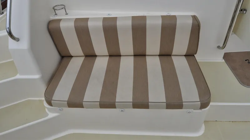 Slide: The Image of Striped bench seat on 2008 Sabre 42 Hard Top Express boat. - 30