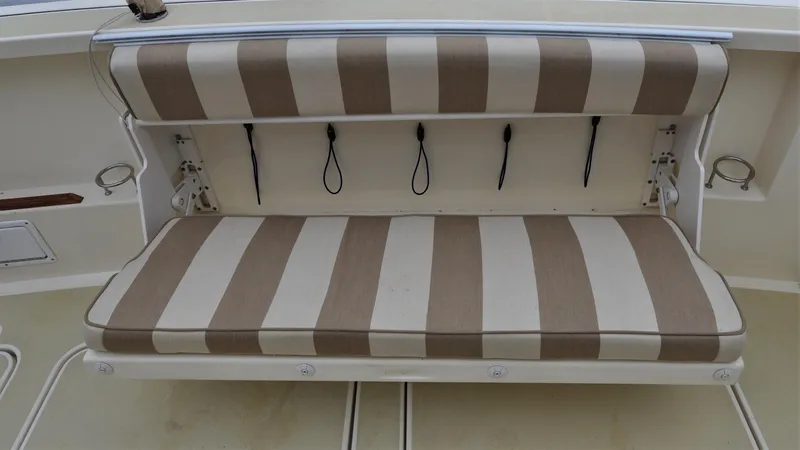 Slide: The Image of Striped bench seat on 2008 Sabre 42 Hard Top Express boat. - 32