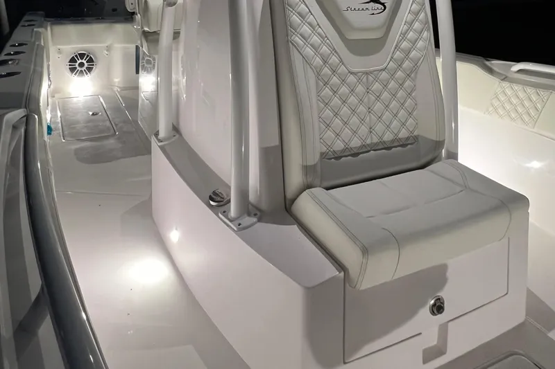 Slide: The Image of 2022 Streamline 26TE boat interior with illuminated seating and modern design. - 7