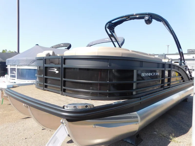 Slide: The Image of 2023 Bennington 23RSBA pontoon boat with sleek design and modern features. - 1