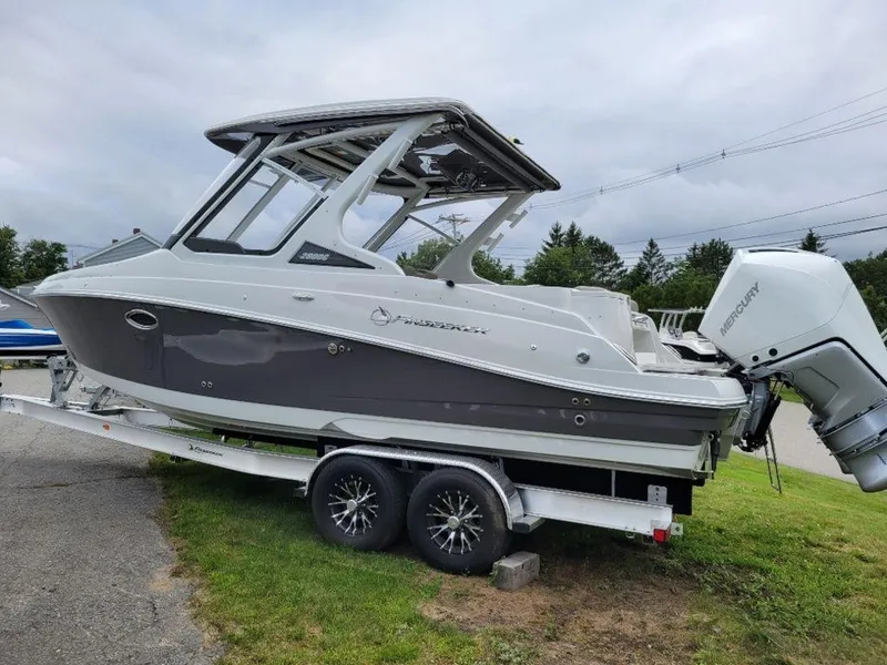 Slide: The Image of 2024 Finseeker 280 DC boat on trailer with outboard motor. - 16