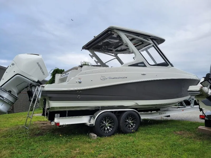 Slide: The Image of 2024 Finseeker 280 DC boat on a trailer, side view. - 19