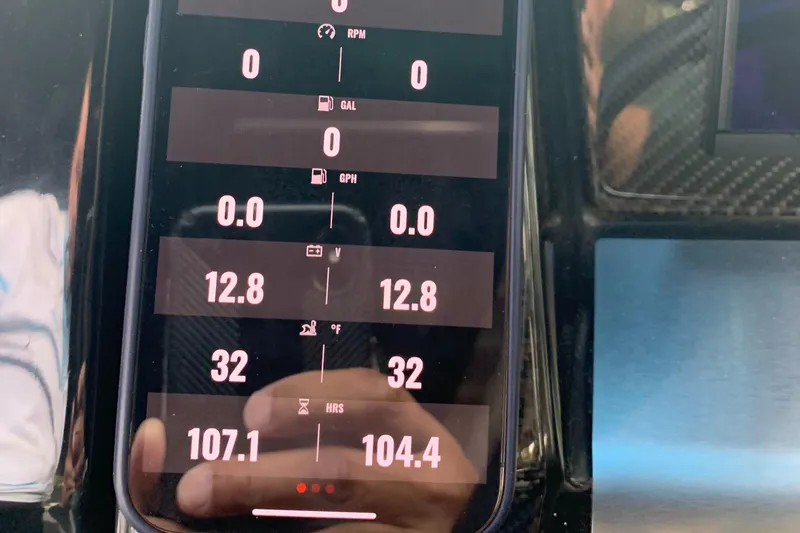 Slide: The Image of Digital dashboard display of a 2019 Four Winns H290 OB boat. - 16