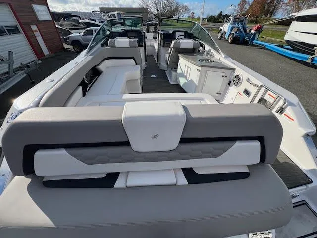 Slide: The Image of 2019 Four Winns H290 OB boat interior with spacious seating and modern design. - 35