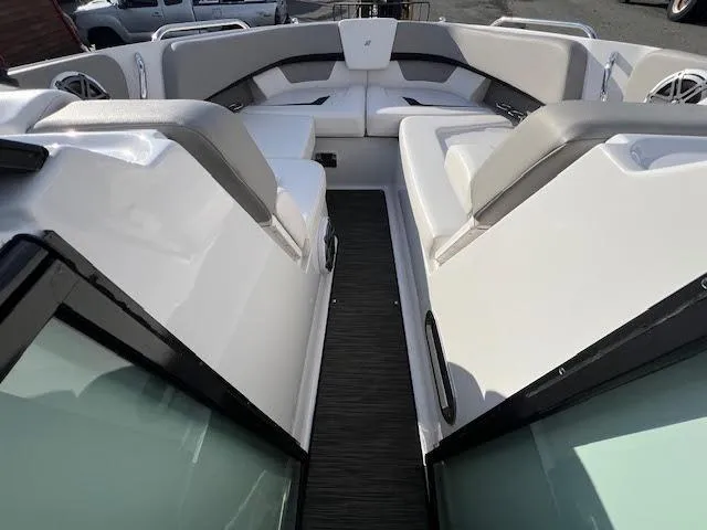 Slide: The Image of 2019 Four Winns H290 OB boat interior with spacious seating and modern design. - 42