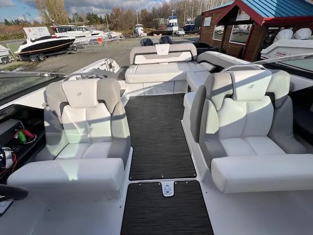 Slide: The Image of 2019 Four Winns H290 OB boat interior with plush seating and modern design. - 45