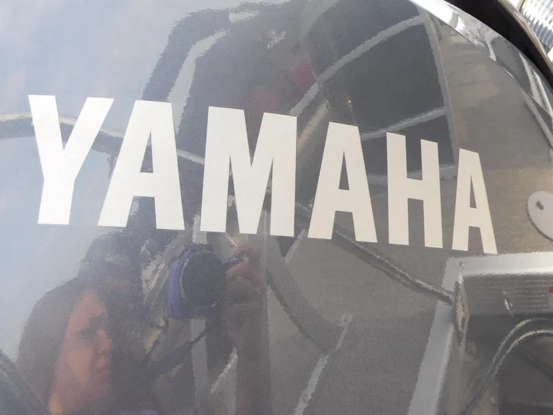 Slide: The Image of Close-up of Yamaha logo on 2023 Bennington 22SXSR boat. - 10