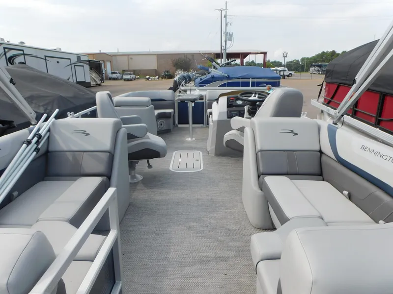 Slide: The Image of 2023 Bennington 22SXSR pontoon boat interior with spacious seating and modern design. - 4