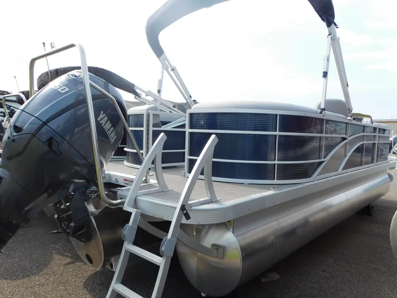 Slide: The Image of 2023 Bennington 22SXSR pontoon boat with Yamaha outboard motor. - 9