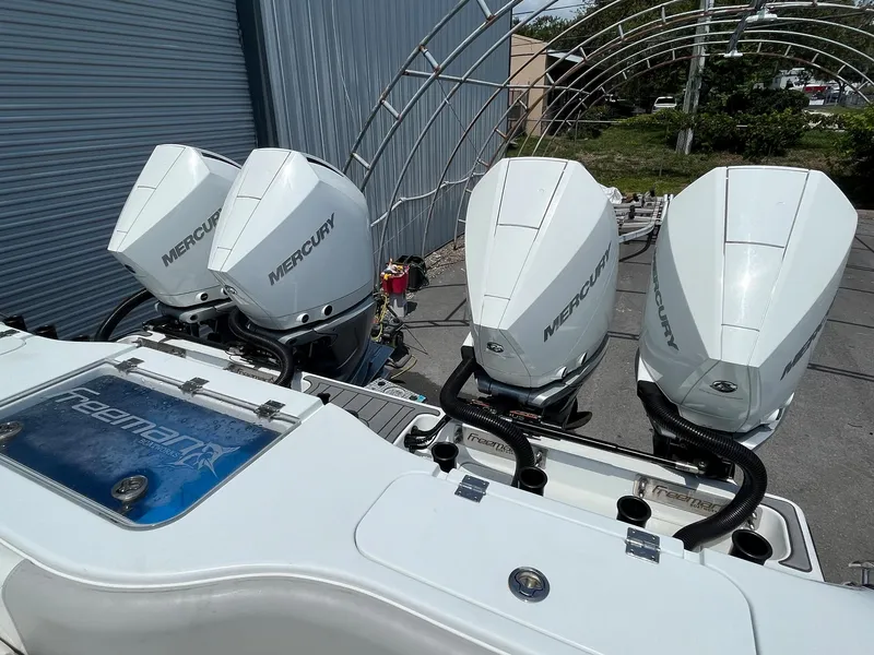 Slide: The Image of Freeman 37 VH 2021 boat with four Mercury outboard engines. - 10