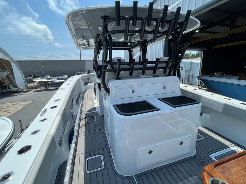 Slide: The Image of Freeman 37 VH 2021 boat interior with rod holders and storage compartments. - 14