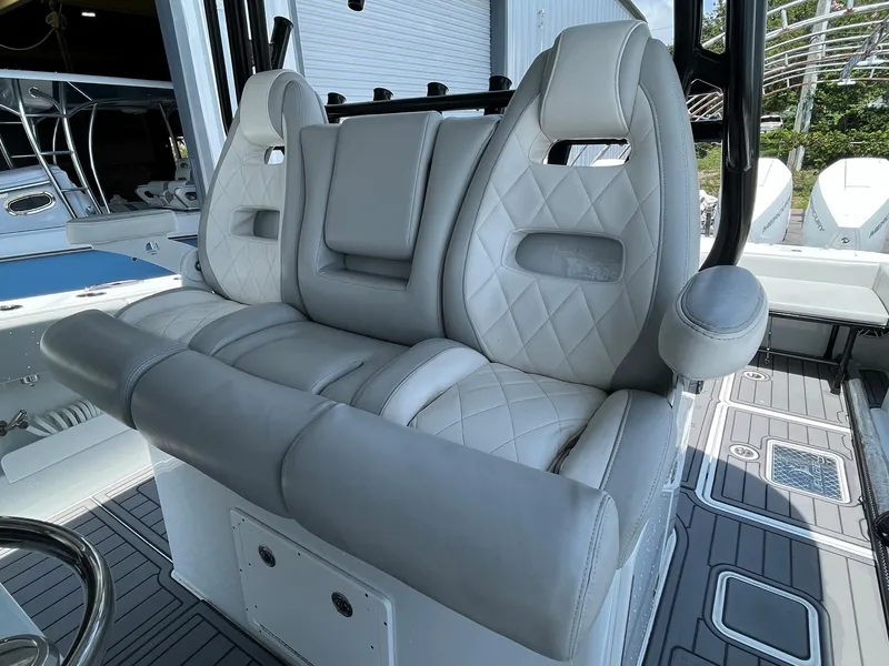 Slide: The Image of Luxurious seating on a 2021 Freeman 37 VH boat with diamond-stitched upholstery. - 15