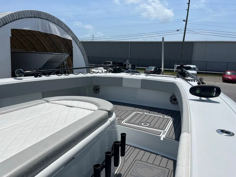 Slide: The Image of 2021 Freeman 37 VH boat interior with cushioned seating and rod holders. - 18