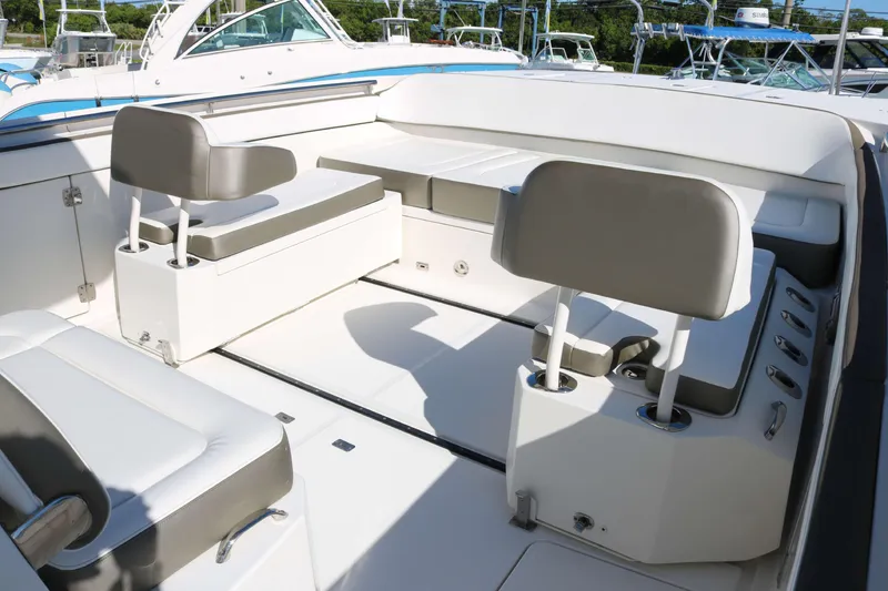 Slide: The Image of 2023 World Cat 400 CC-X boat interior with modern seating and sleek design. - 8