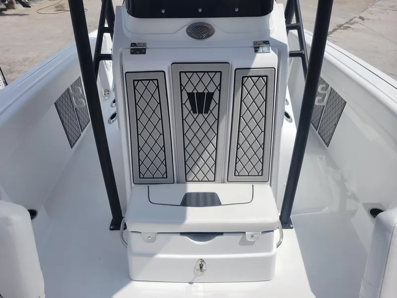 Slide: The Image of 2024 Wellcraft 222 Fisherman boat interior, featuring storage compartments and seating. - 14