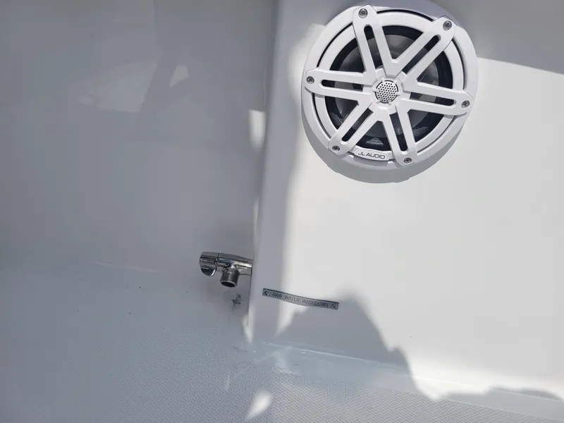 Slide: The Image of Close-up of 2024 Wellcraft 222 Fisherman boat speaker and hardware. - 19
