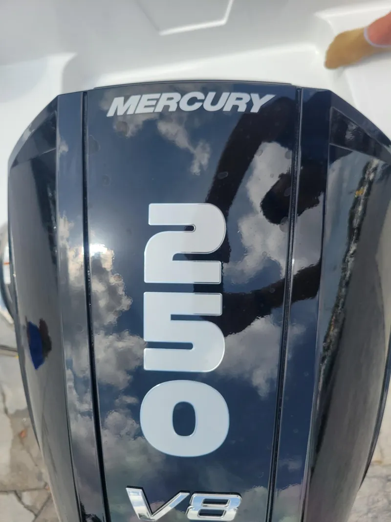 Slide: The Image of Mercury 250 V8 outboard engine on a 2024 Wellcraft 222 Fisherman boat. - 28