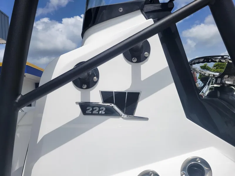Slide: The Image of 2024 Wellcraft 222 Fisherman boat, close-up of logo and model number. - 6