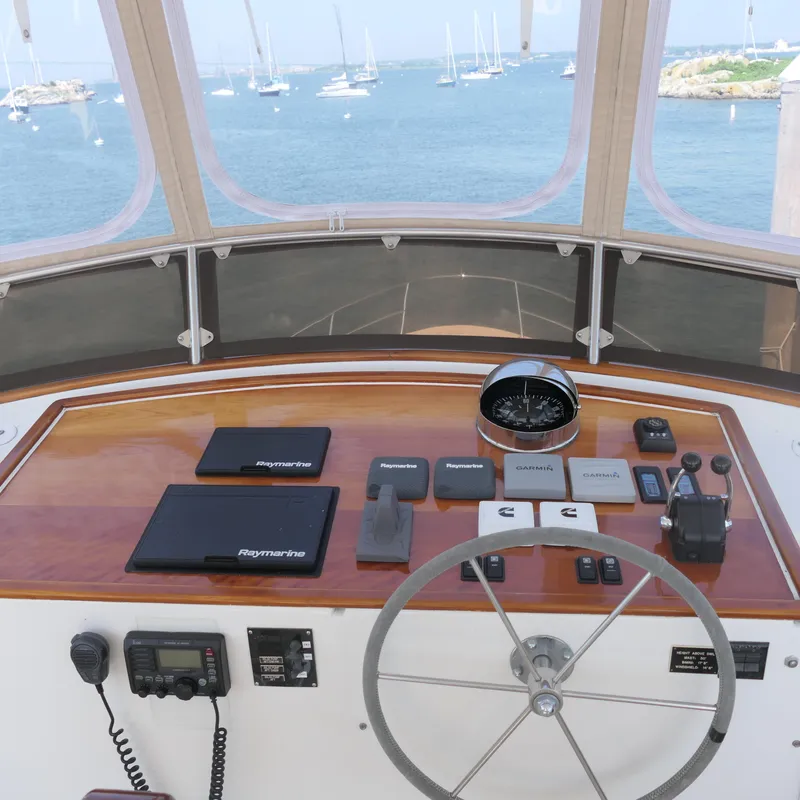 Slide: The Image of Helm of 2020 Alden Motor Yacht with navigation equipment and ocean view. - 18