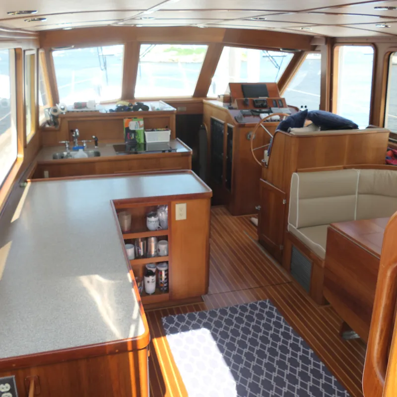 Slide: The Image of Interior of 2020 Alden Motor Yacht with wooden finishes and modern amenities. - 21