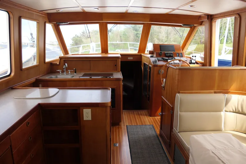 Slide: The Image of Interior of 2020 Alden Motor Yacht with wooden finishes and modern amenities. - 24