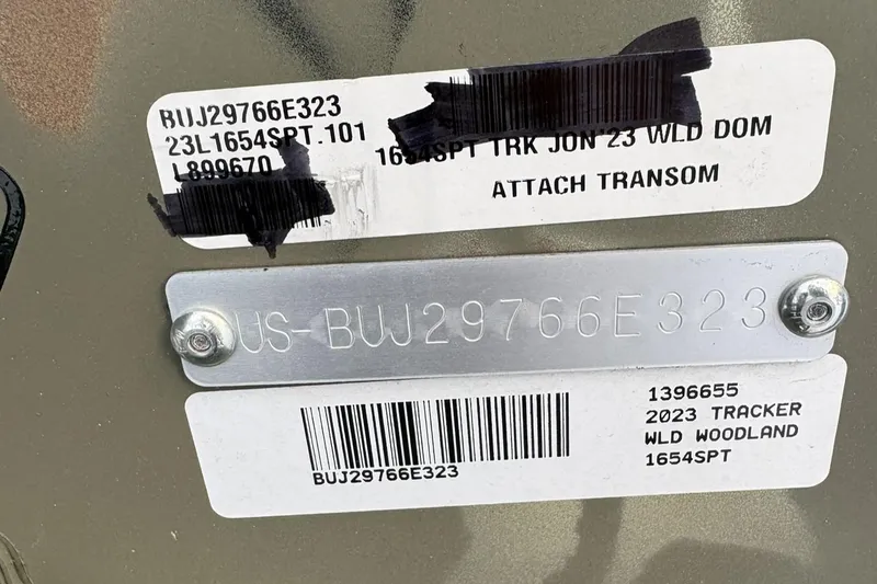 Slide: The Image of 2023 Tracker Grizzly 1654 T Sportsman identification tags and serial numbers. - 11