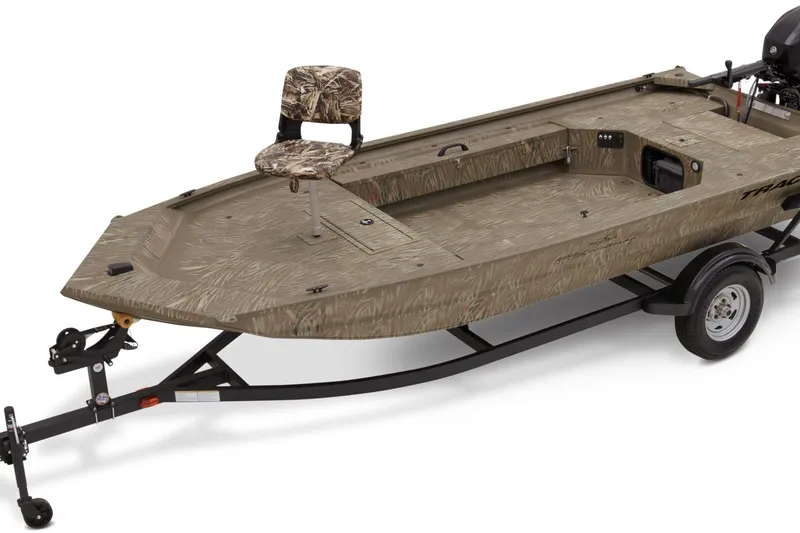 Slide: The Image of 2023 Tracker Grizzly 1654 T Sportsman boat on trailer, featuring camo seating and design. - 14