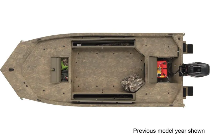 Slide: The Image of 2023 Tracker Grizzly 1654 T Sportsman boat with Mercury 40 engine on snowy terrain. - 2