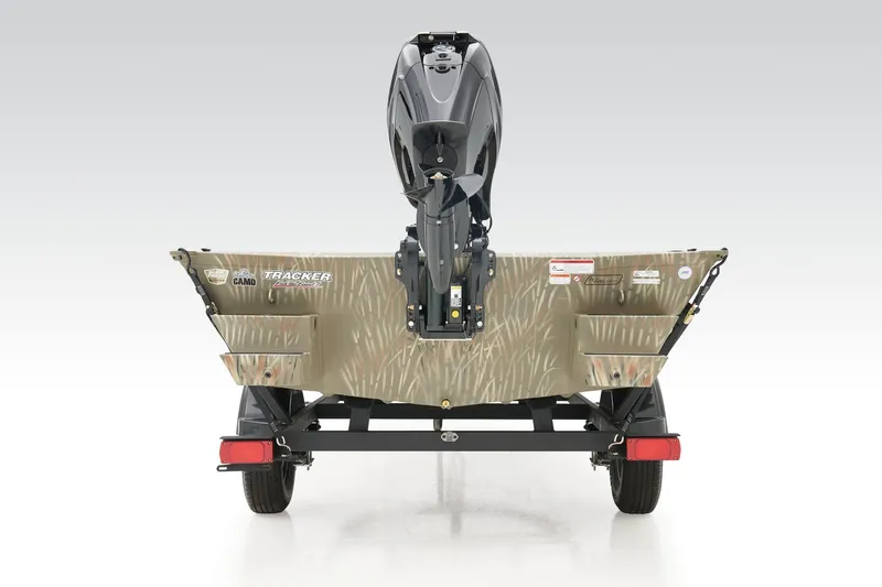 Slide: The Image of 2023 Tracker Grizzly 1654 T Sportsman boat, rear view with camo design and motor. - 32