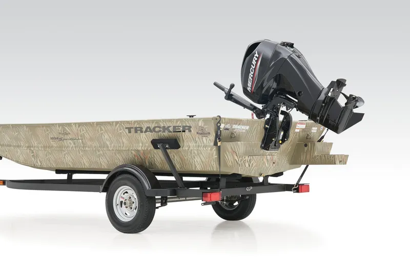 Slide: The Image of 2023 Tracker Grizzly 1654 T Sportsman boat with Mercury outboard motor on trailer. - 33