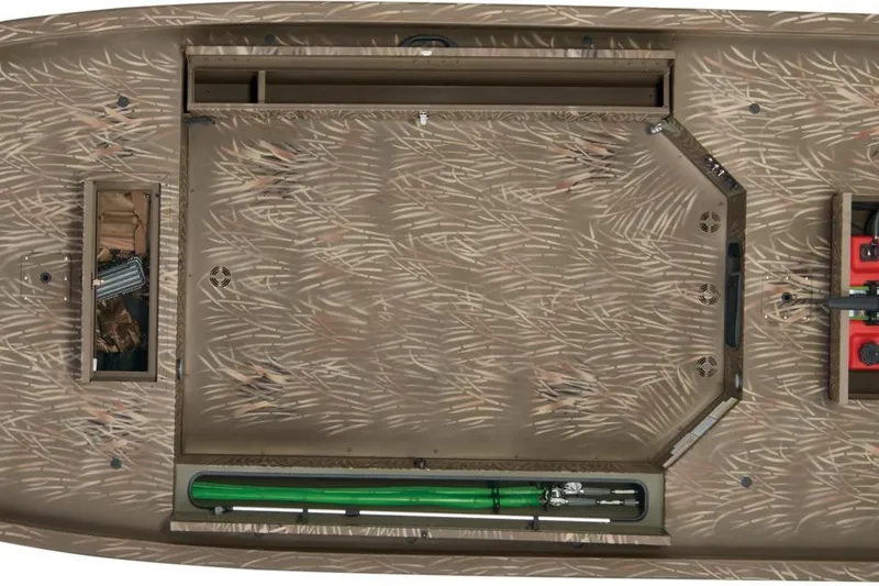 Slide: The Image of 2023 Tracker Grizzly 1654 T Sportsman boat interior with camo design and storage compartments. - 43