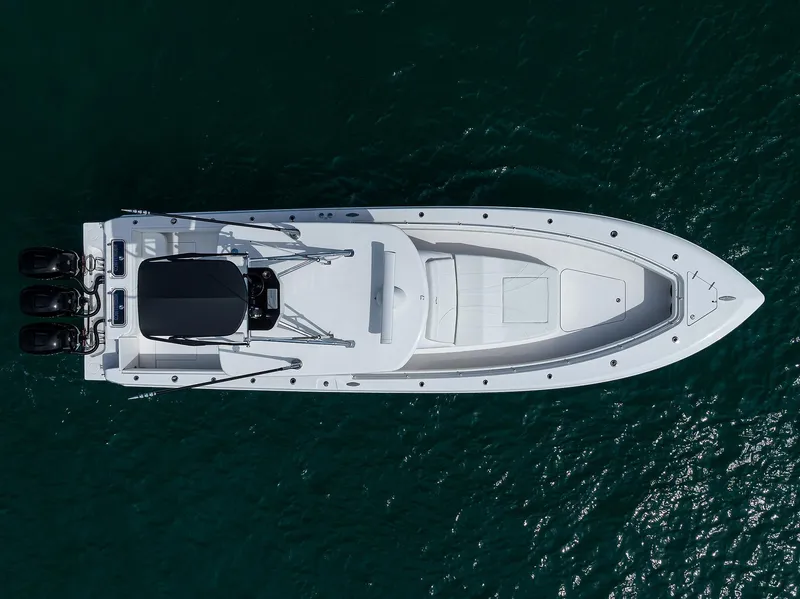 Slide: The Image of Aerial view of 2025 Contender 39FA boat on water. - 7