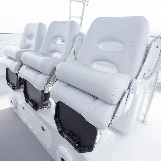 Slide: The Image of Contender 44FA 2025 boat seats in white leather, ergonomic design, and adjustable armrests. - 18