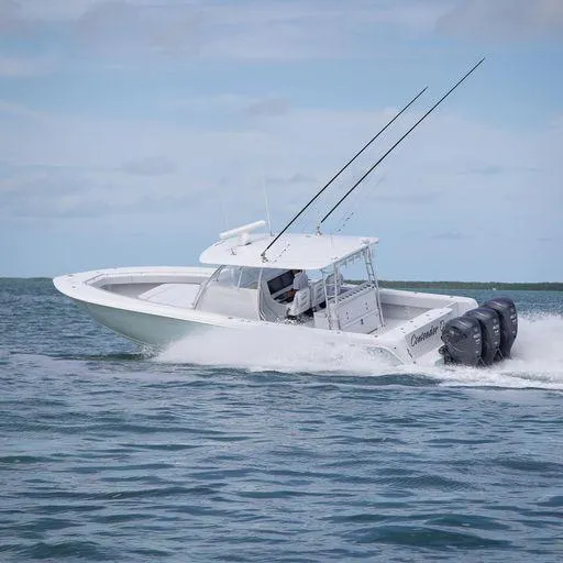 Slide: The Image of 2025 Contender 44FA boat cruising on open water. - 6