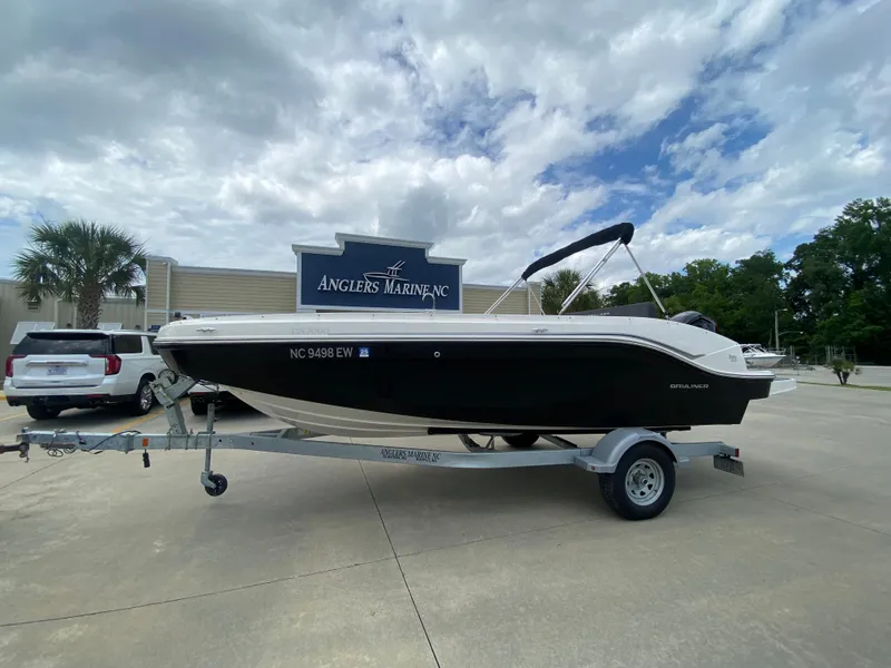 Slide: The Image of 2022 Bayliner DX2000 boat on trailer at Angler's Marine NC dealership. - 0