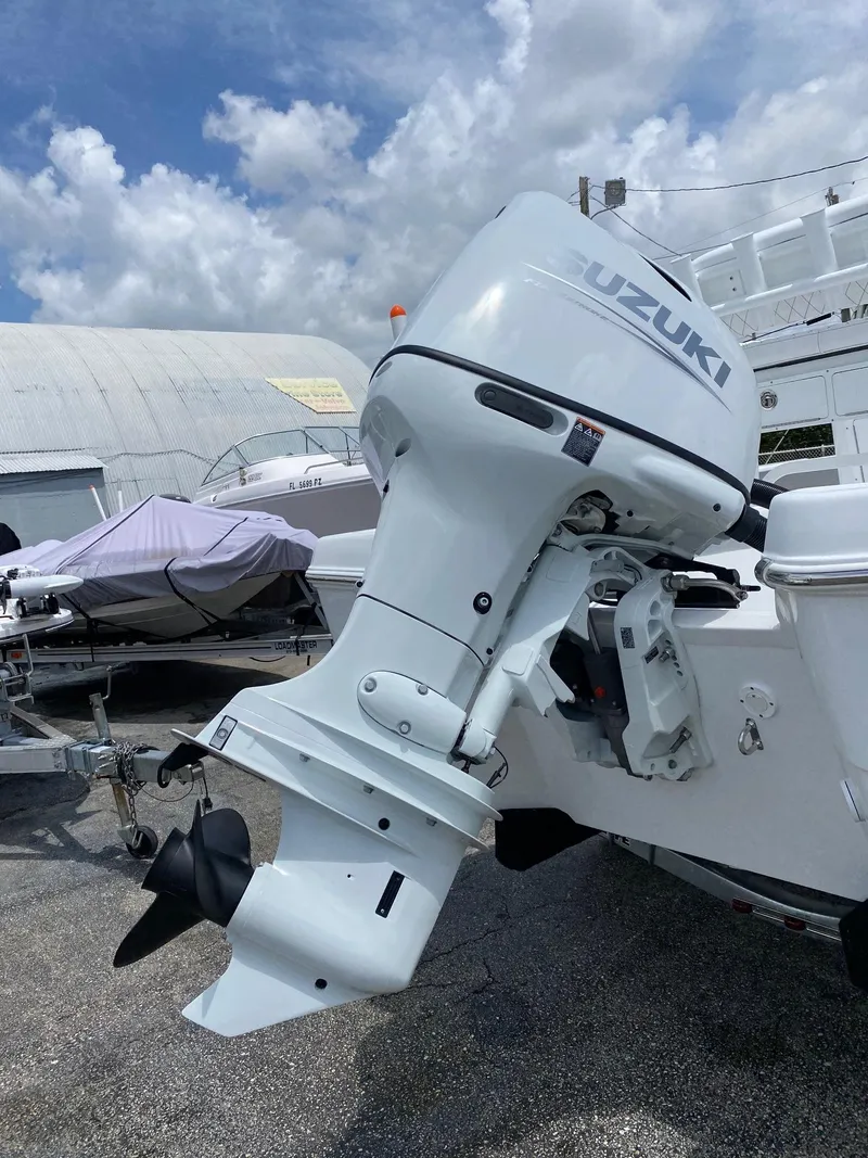 Slide: The Image of 2023 Savannah 190IS boat with Suzuki outboard motor. - 23