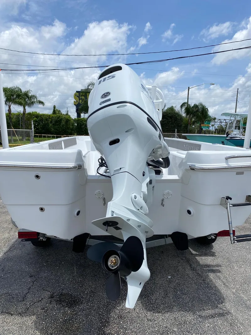 Slide: The Image of 2023 Savannah 190IS boat with outboard motor, rear view. - 24