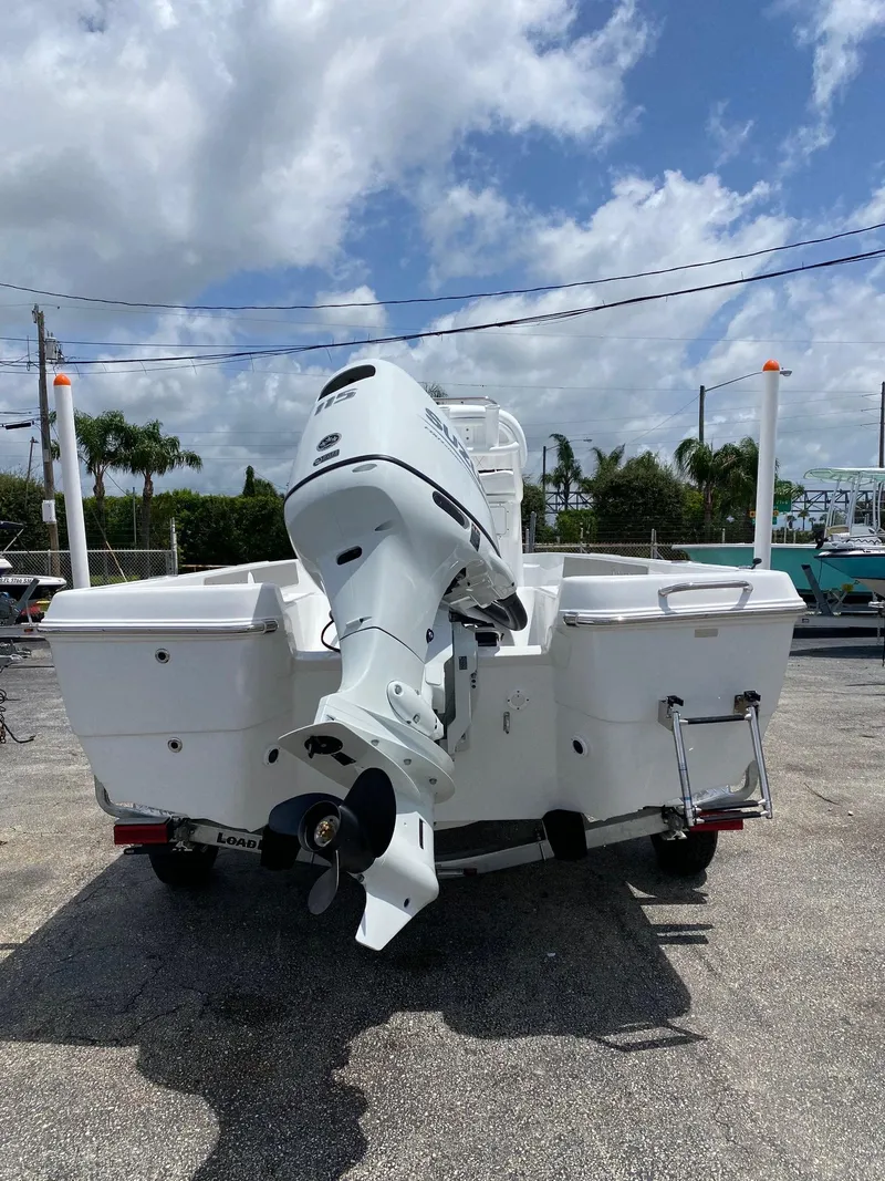 Slide: The Image of 2023 Savannah 190IS boat with outboard motor, rear view. - 4