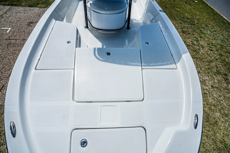 Slide: The Image of 2021 Catalyst 2300 BAY boat deck with storage compartments. - 13