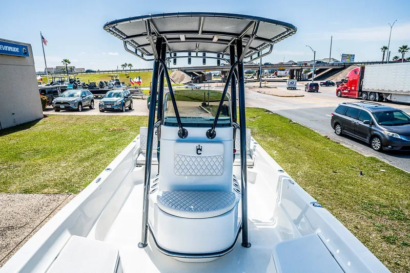 Slide: The Image of 2021 Catalyst 2300 BAY boat on display at a dealership. - 14