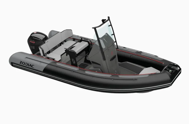 The Image of 2023 Zodiac Open 5.5 inflatable boat with seating and outboard motor. - 1