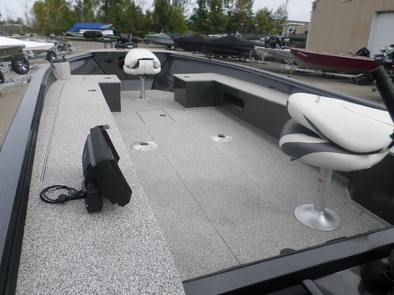 Slide: The Image of 2023 Polar Kraft OLV 186 T boat interior with seating and storage compartments. - 3