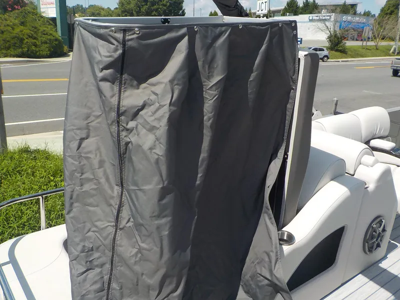 Slide: The Image of 2023 SunCatcher Elite 326SS boat with privacy curtain on deck. - 11