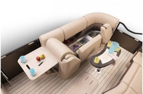 Slide: The Image of 2023 SunCatcher Elite 326SS boat interior with beige seating and storage compartments. - 12