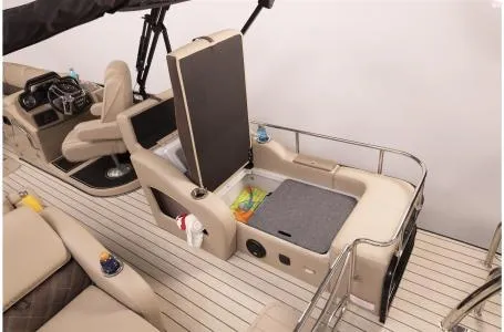 Slide: The Image of 2023 SunCatcher Elite 326SS boat interior with storage compartments. - 16