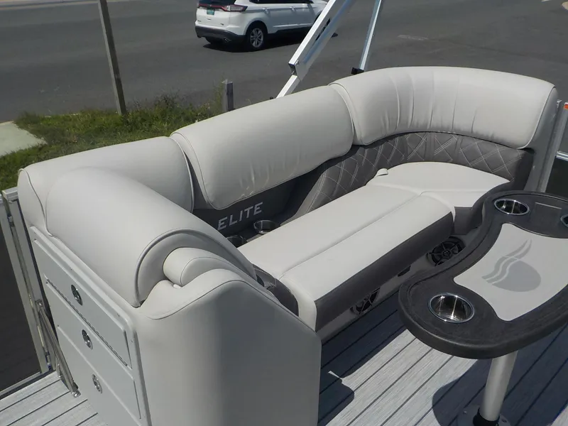 Slide: The Image of Luxurious seating area on the 2023 SunCatcher Elite 326SS pontoon boat. - 23