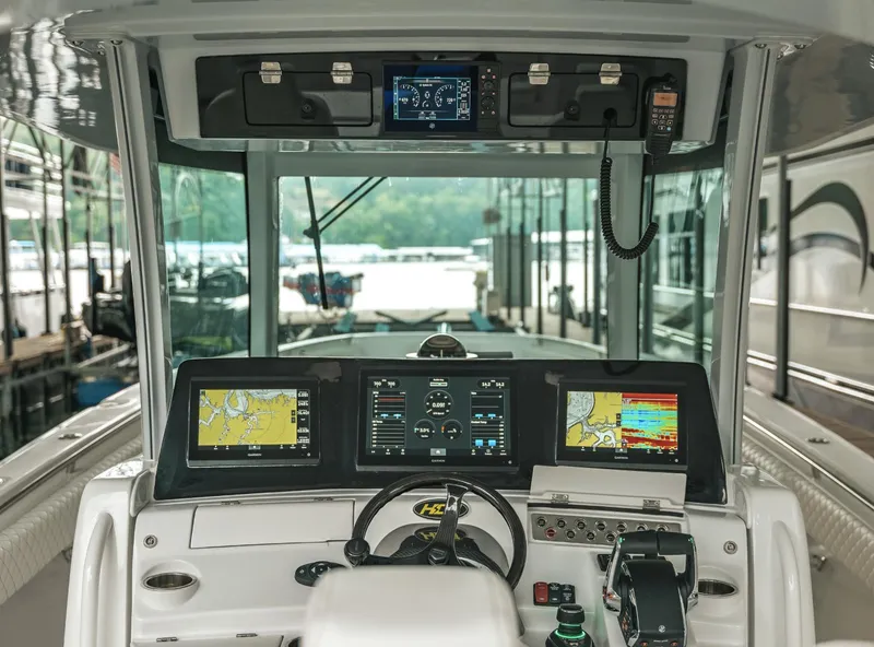 Slide: The Image of 2023 HCB 39 Speciale boat cockpit with advanced navigation systems. - 20